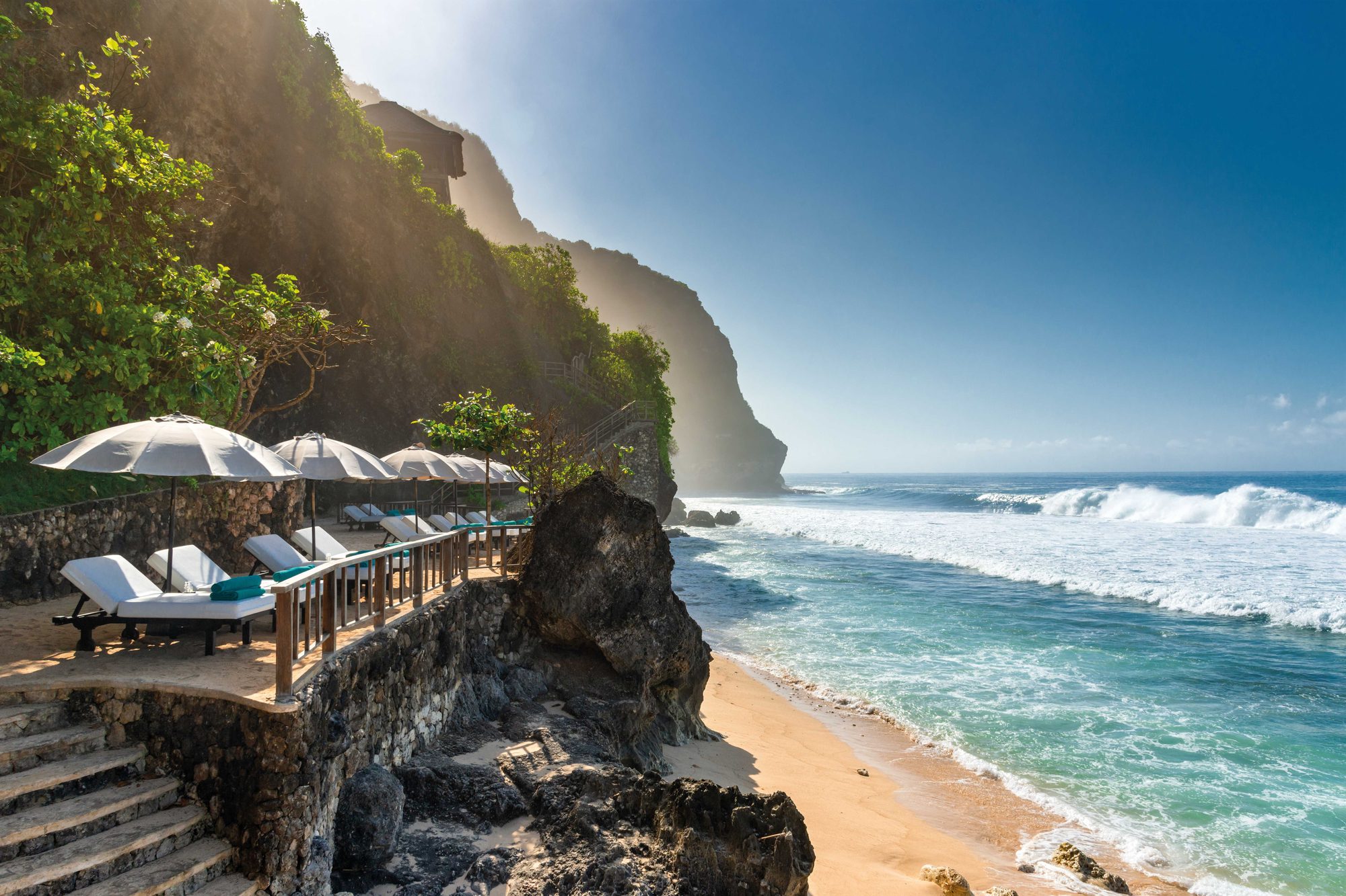 Bulgari Resort Bali — the beach club beneath the cliffs · Uluwatu, Indonesia