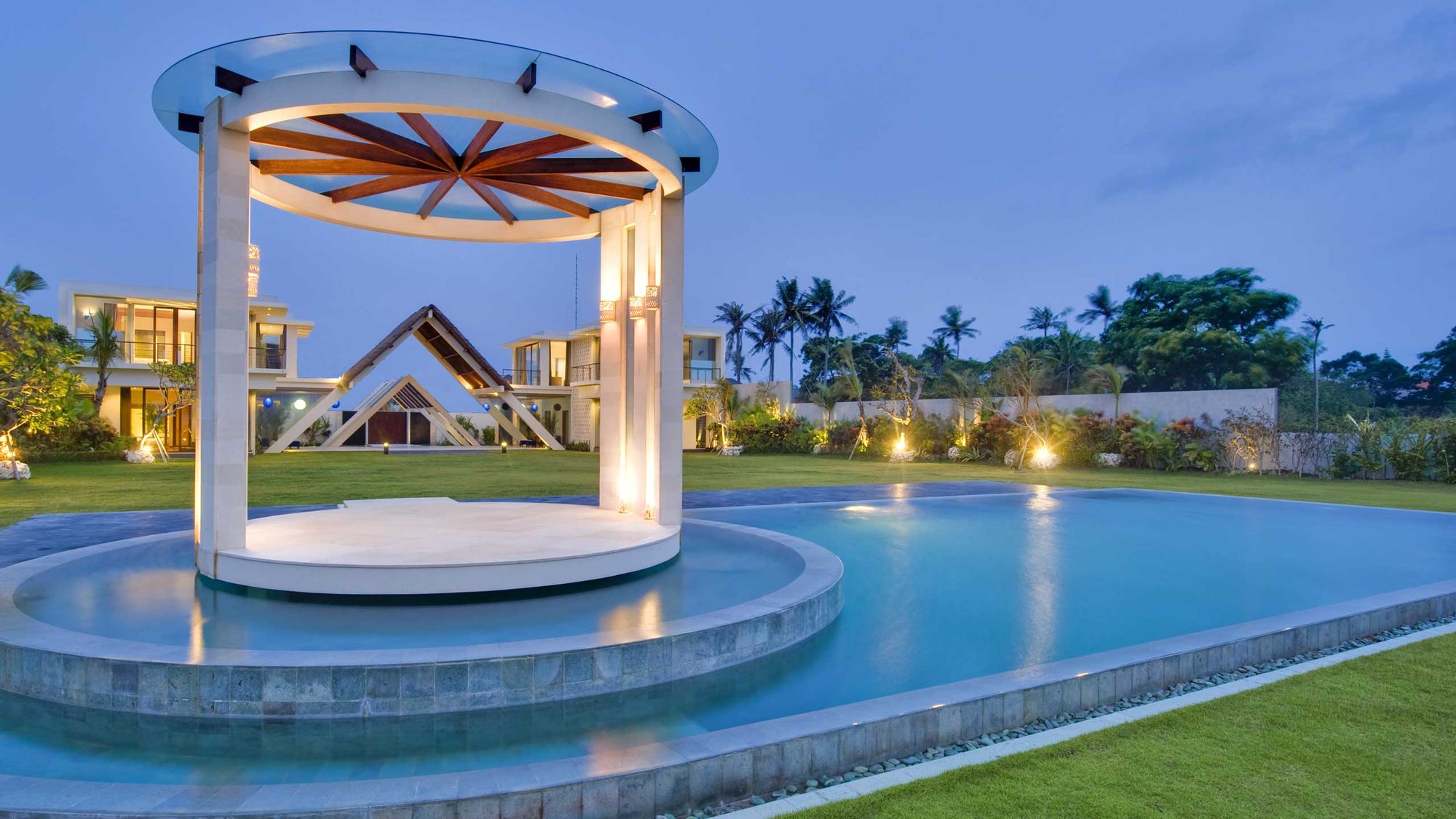 Villa Phalosa — the round pool pavilion at dusk · Seminyak, Indonesia